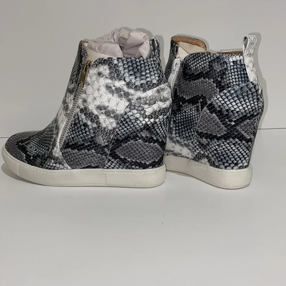 High-Top Wedge Sneakers.